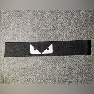 Saks Fifth Avenue Black and White Eyewear or Hairband with Eye Motif